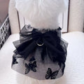 Black gauze tulle princess skirt costume on a small dog, showing the layered skirt and fitted bodice.