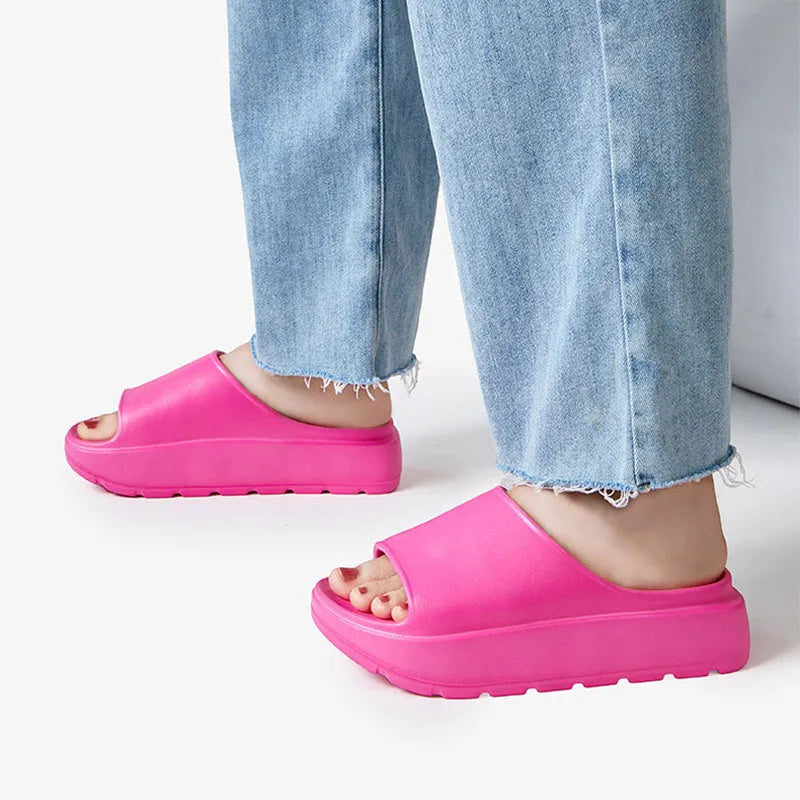 Women's thick sole fish mouth slippers in beige colour, showing the elevated EVA outsole.