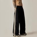 Black men's wide leg high-waist trousers with a straight-leg cut for summer casual wear.
