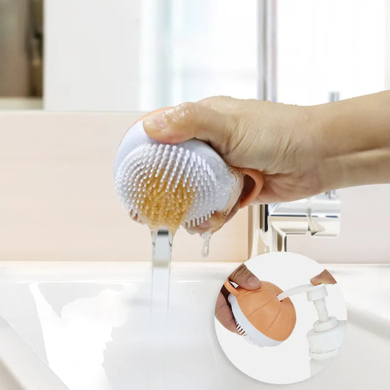 Orange TPR pet bath brush with shampoo dispenser and silicone bristles for dog and cat grooming