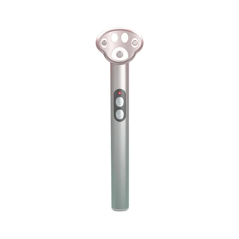 Cat's Paw design micro-current eye massager in gradient pink with LED light display.