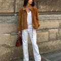 A solid colour loose-fit retro-style polyester jacket for men and women.