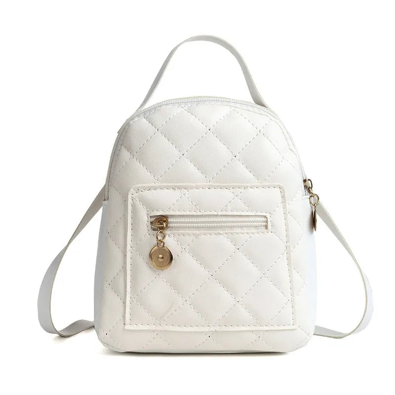 Girls' square hard PU backpack with embroidery, soft handle, in white, black, or pink.