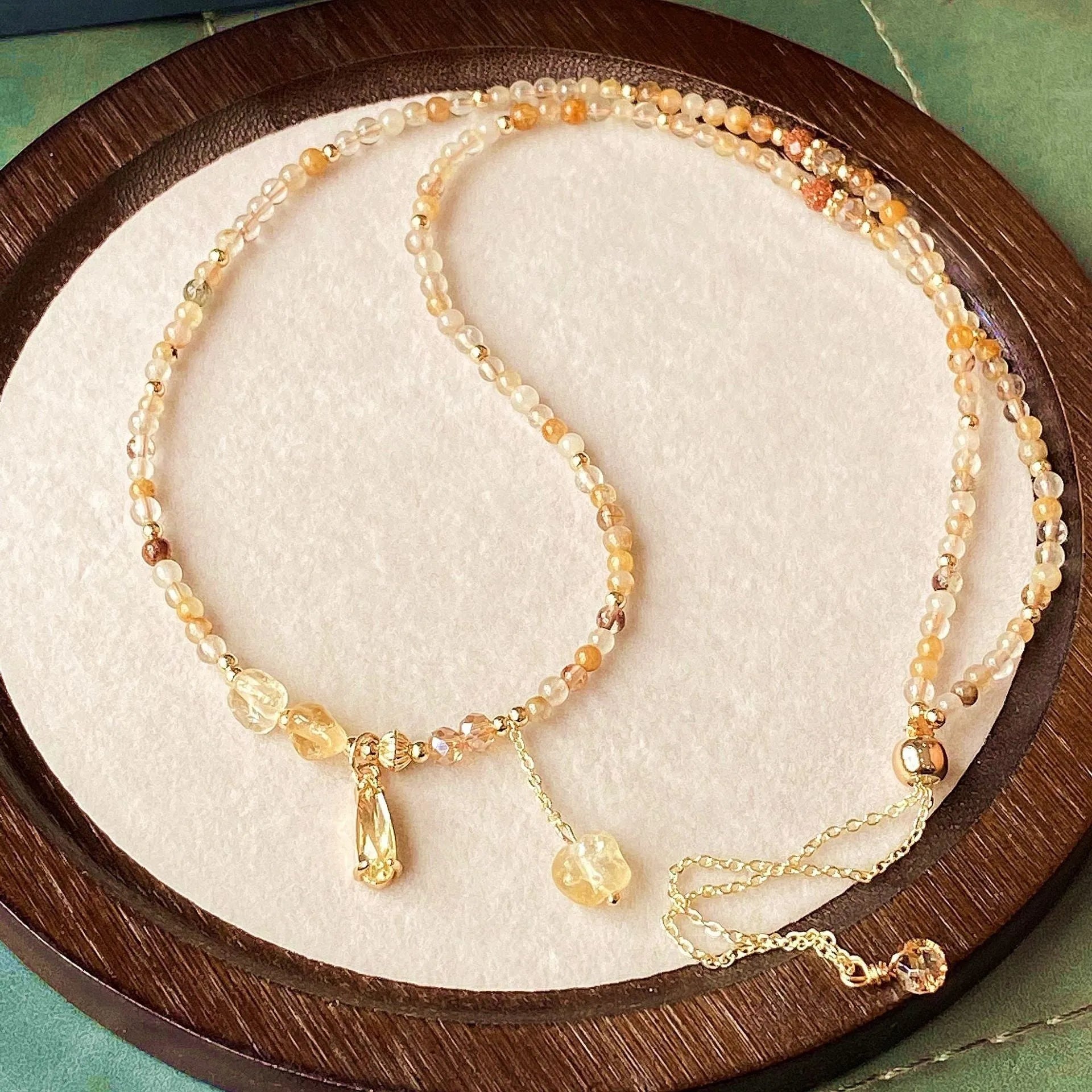 Women's multi-layer bracelet with caramel citrine stones and gold electroplated three-circle design