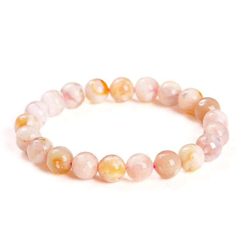 Natural cherry agate bracelet with round geometric beads in a sweet style for women.