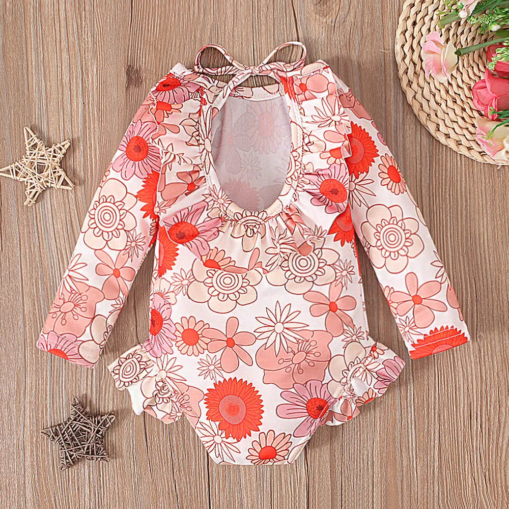 Girl's floral pattern open back swimsuit in orange red, available in sizes 70 to 110 yards.