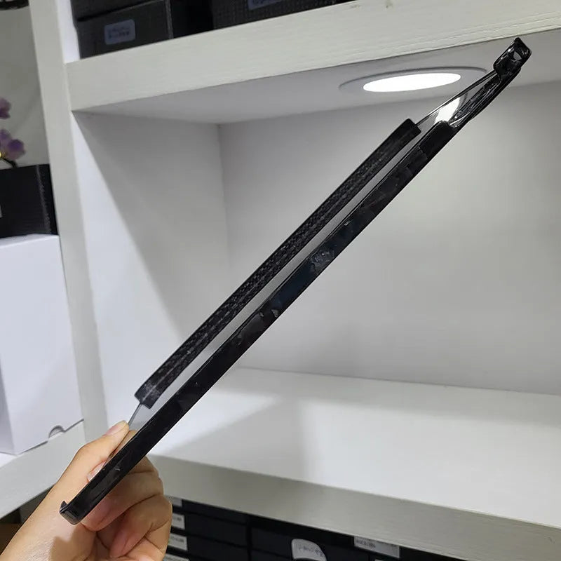 Genuine carbon fibre hard protective cover for Apple iPad Pro 11 in a plaid pattern.