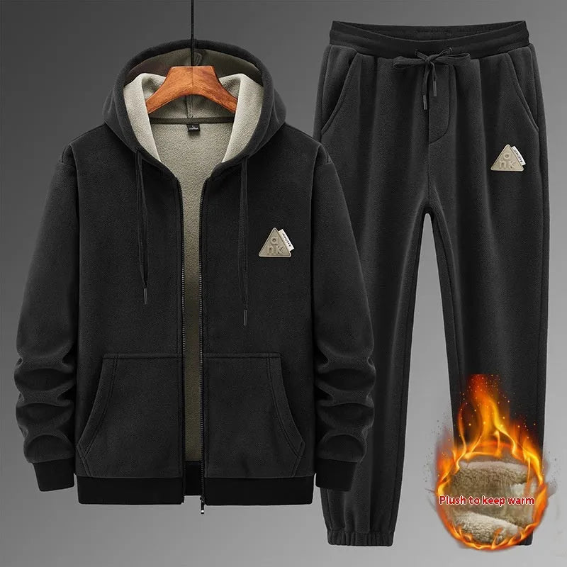 Grey cashmere hooded sweater and matching pants casual sports suit laid flat.