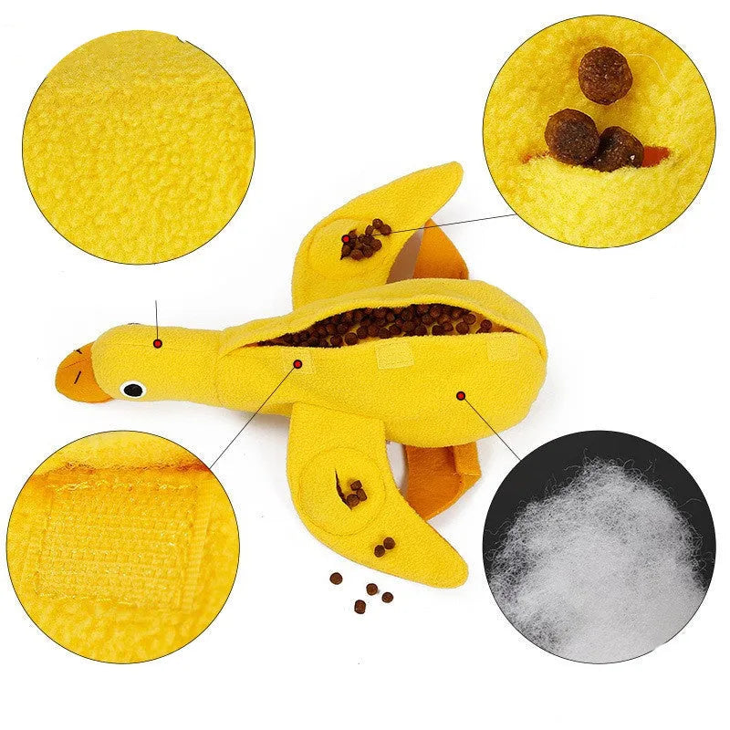 Yellow plush teddy bear dog toy with an attached duck doll, featuring a squeaker and treat compartment.