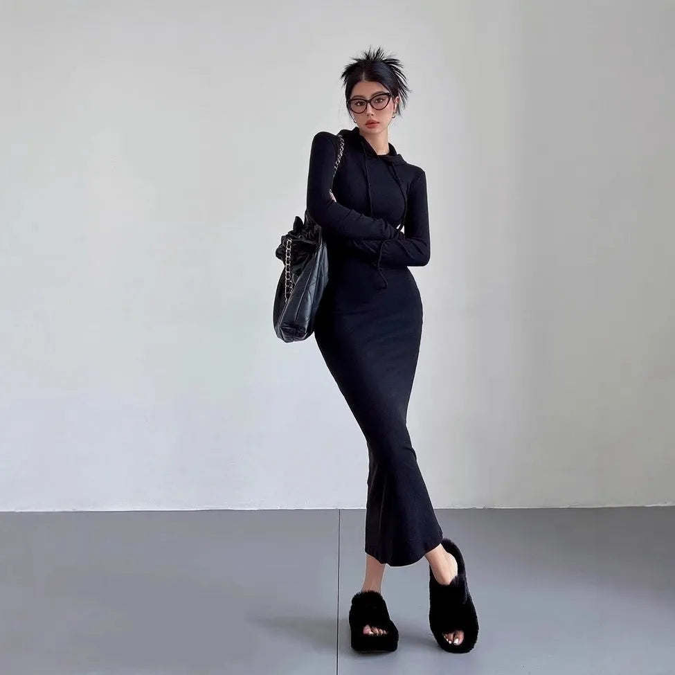 Women's grey hooded sheath dress with long sleeves and a high waist, shown in a front view.
