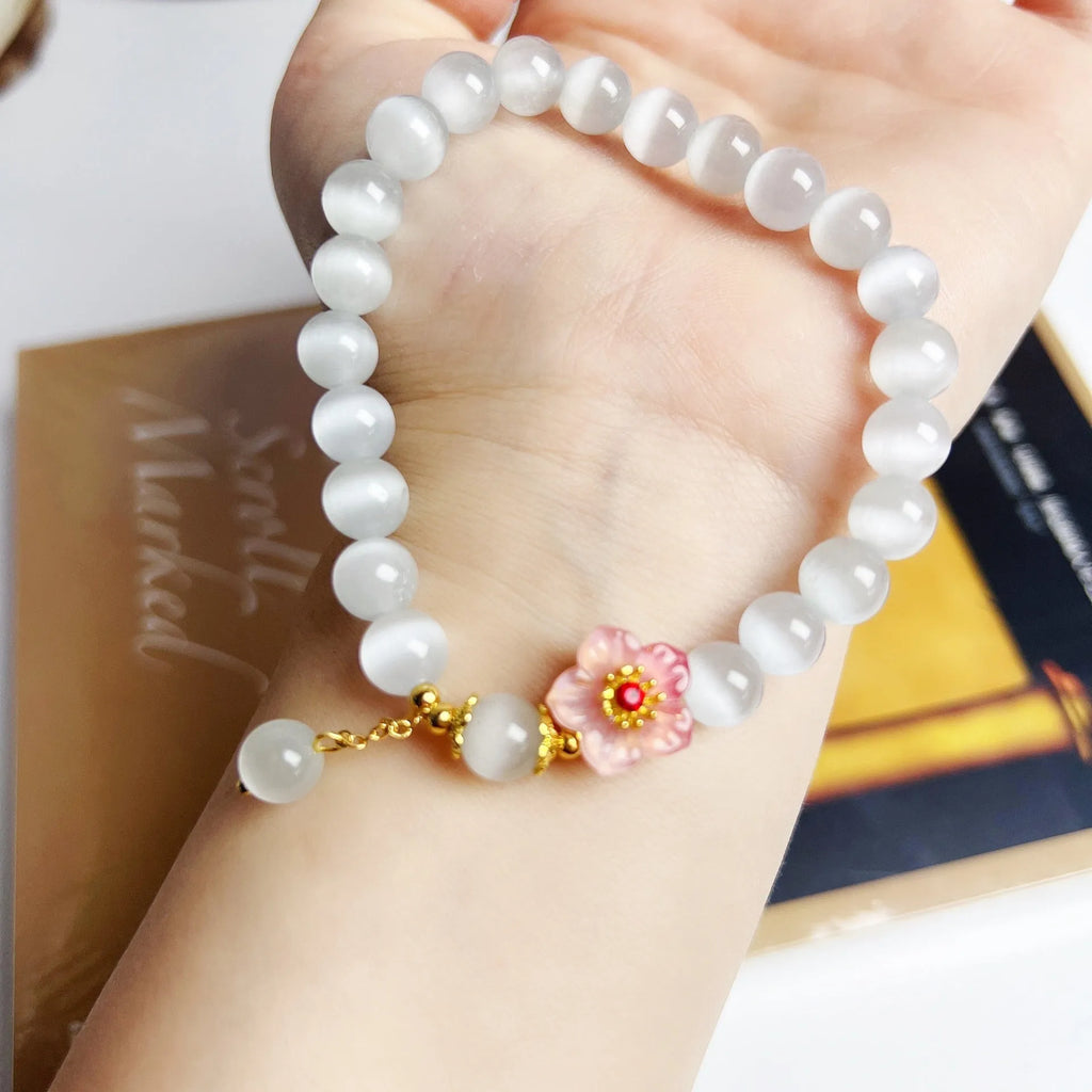 White opal flower beaded bracelet handmade from glass and coloured glaze jewellery