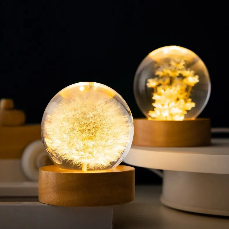 Luminous 3D dandelion crystal ball night light on a beech wood stand