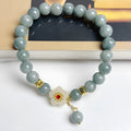 Women's adjustable jade bracelet with retro style and rope closure on wrist