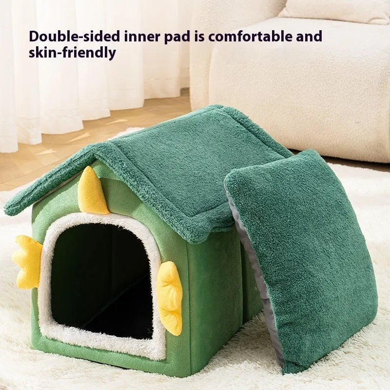 Large grey closed cat nest pet bed with a thick removable cushion inside, shown next to a tabby cat.