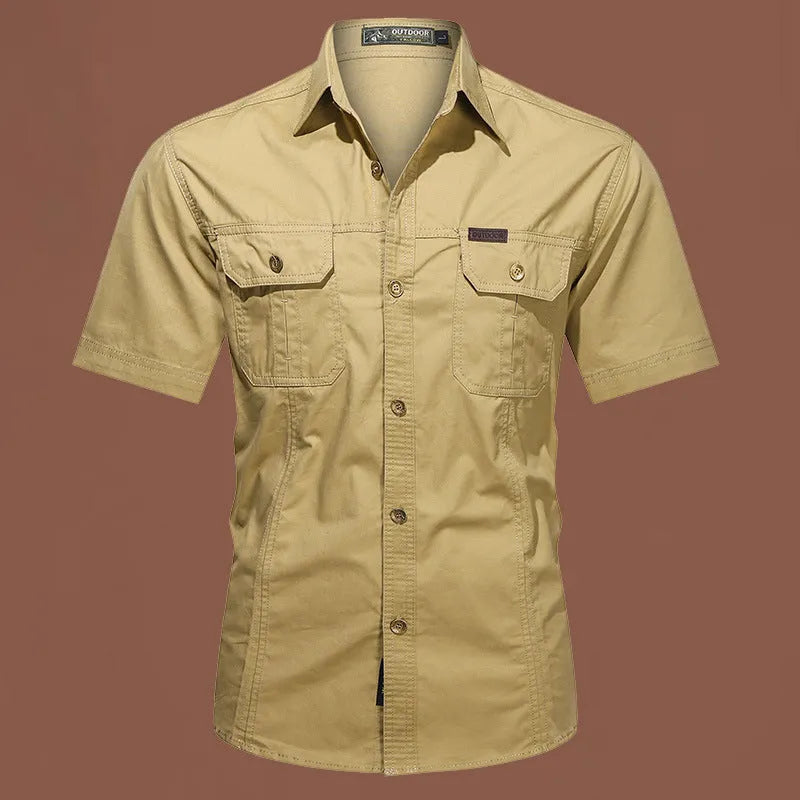 Men's short sleeve cotton shirt in army green colour, showing loose fit and cardigan style on a hanger.