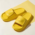 Unisex thick-soled EVA flip flop slippers in multiple colours on a white background.