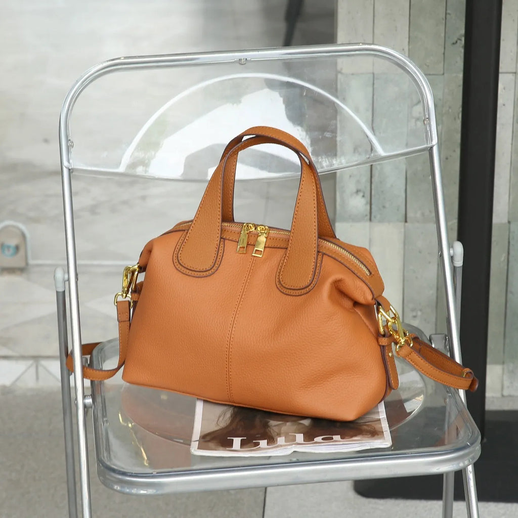 Women's genuine leather cross-body bag in horizontal square shape with internal compartments