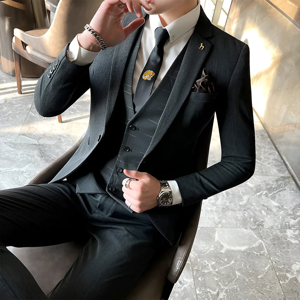 Men's slim fit suit in black and dark grey, cotton blend fabric, business formal wear set.