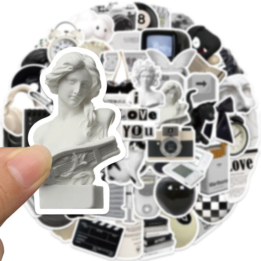 Pack of 61 black and white simple style PVC waterproof stickers for laptops and phones.