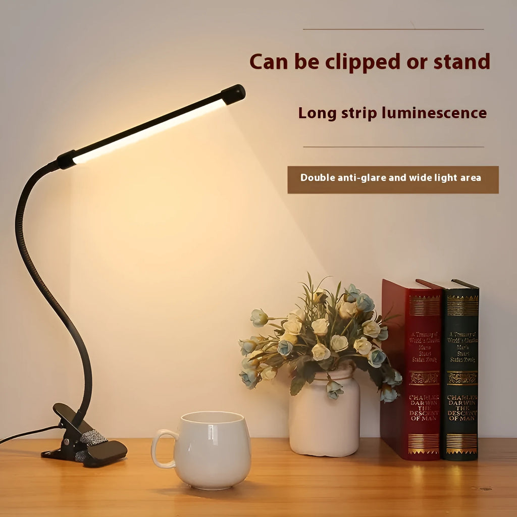 Black and white USB LED desk lamp with eye protection feature measuring 26cm length