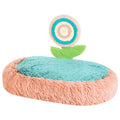 Pink elliptical plush cat nest bed, disassembled to show washable design.