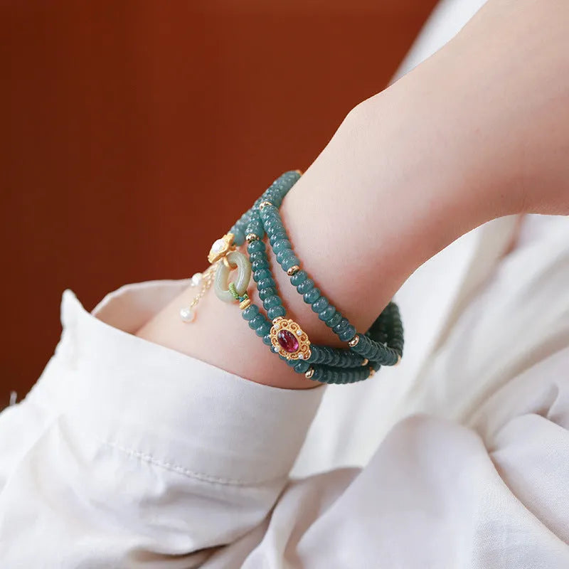 Blue water jade abacus bead bracelet with tourmaline rings and pearls on elastic string