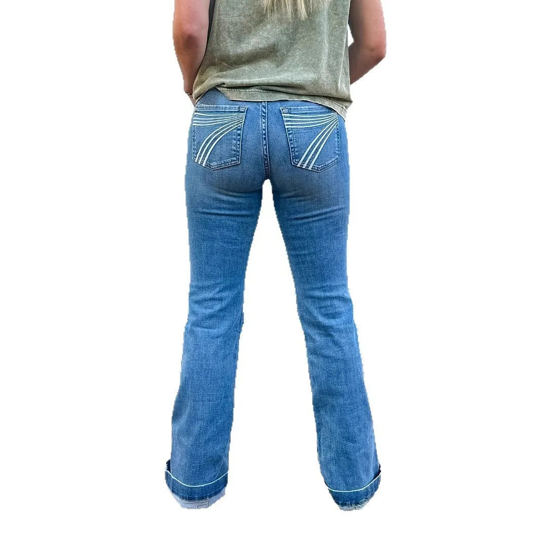 Blue embroidered slim fit jeans with a flared leg on a neutral background.