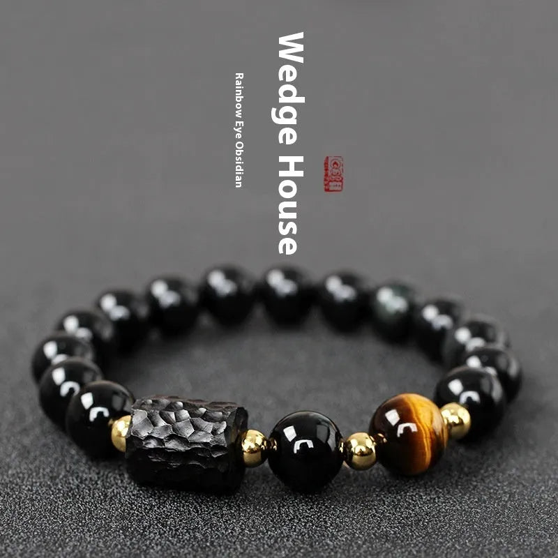 Handmade obsidian bracelet with red and yellow tiger eye beads in circle design