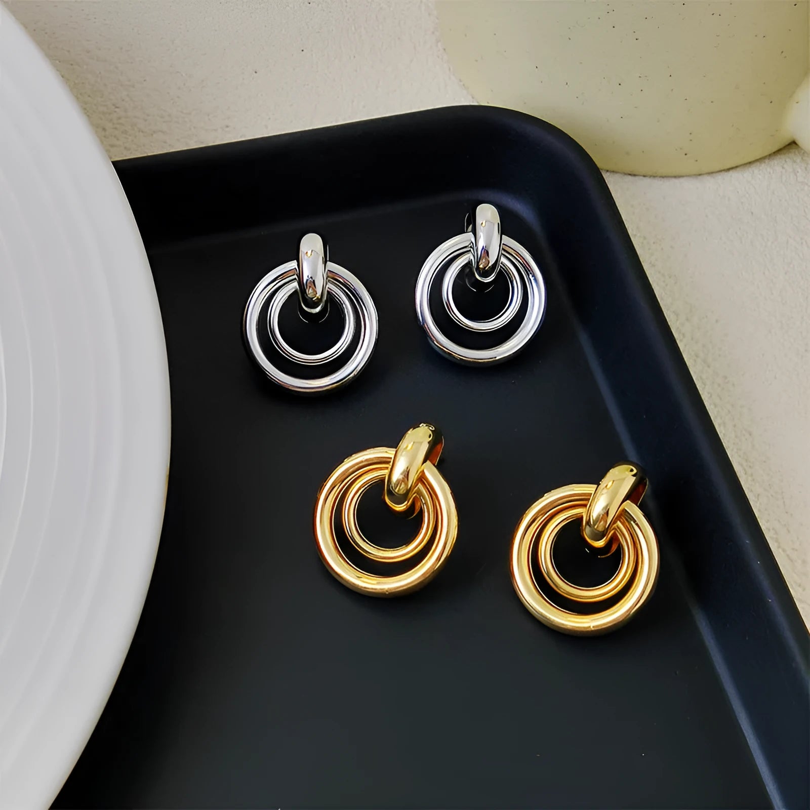 Geometric round ring drop earrings in gold or silver colour with irregular shape