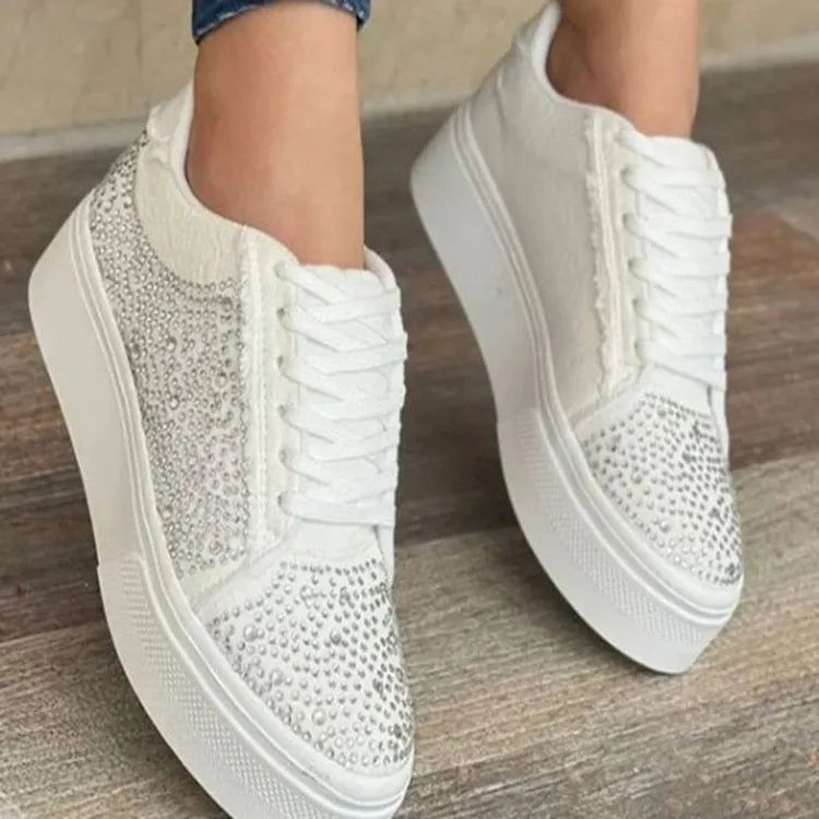 Plus size women's black lace-up casual sports shoes with rhinestone details and a thick flat rubber sole.