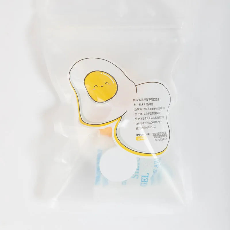 Interactive catnip ball toy in egg shapes with organic catnip filling for wall mounting