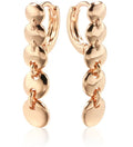 Gold retro long woven copper circle hoop earrings on a white background