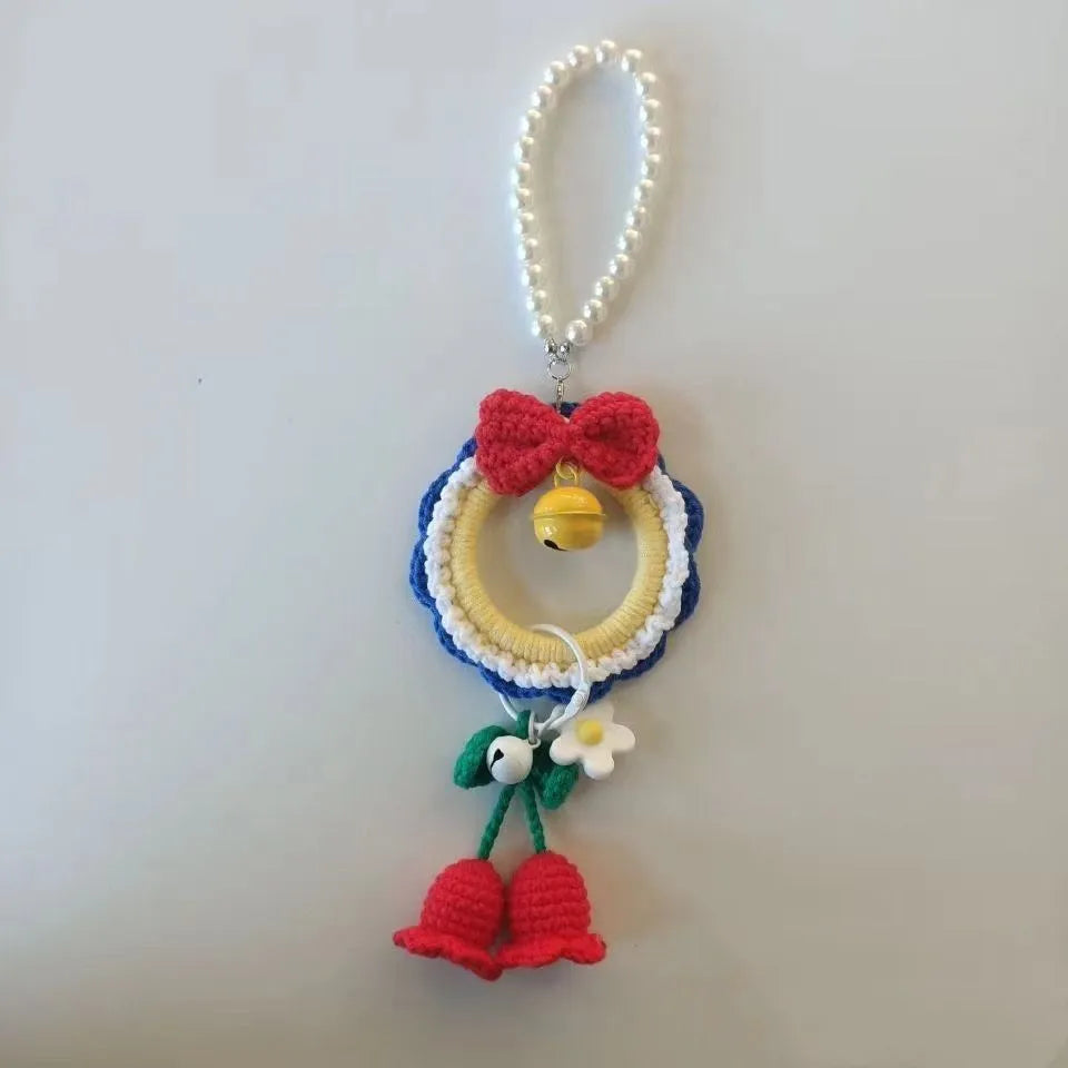 Handmade soft plush yarn car hanging ornament with pom-pom accents for rearview mirror decoration