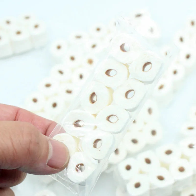 Miniature paper tissue roll model for dollhouse bathrooms measuring 30x15x80mm
