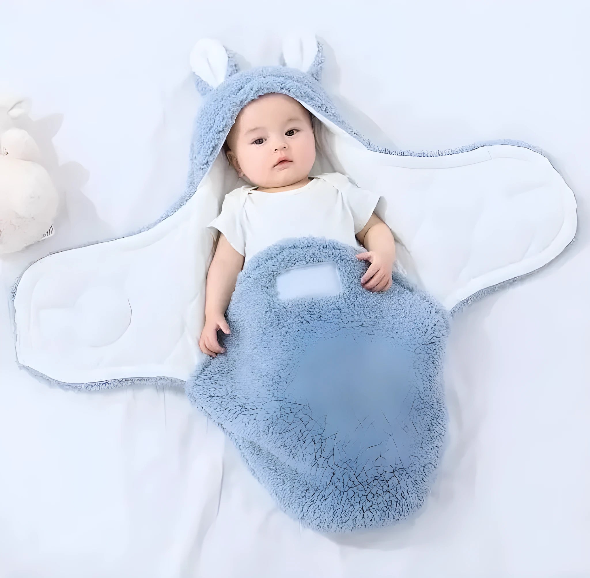 Adjustable baby sleeping bag swaddle blanket showing velcro wings and leg positioner in blue colour