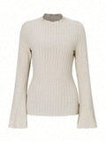 Women's black long sleeve slim fit top with lantern sleeves and round neck