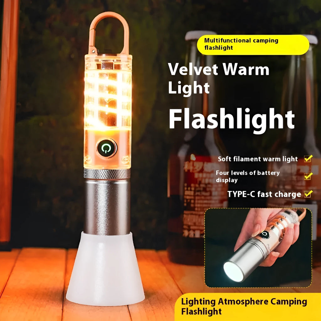Orange and beige multifunctional flashlight with dual LED heads, optical zoom lens, and a metal hanging hook.