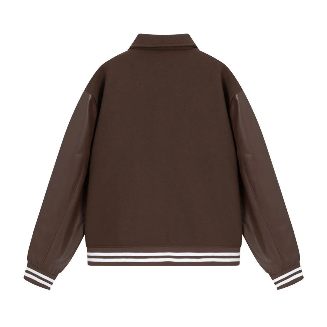Women's apricot wool jacket with bone embroidery on the front, showing casual fit and stitch detail.