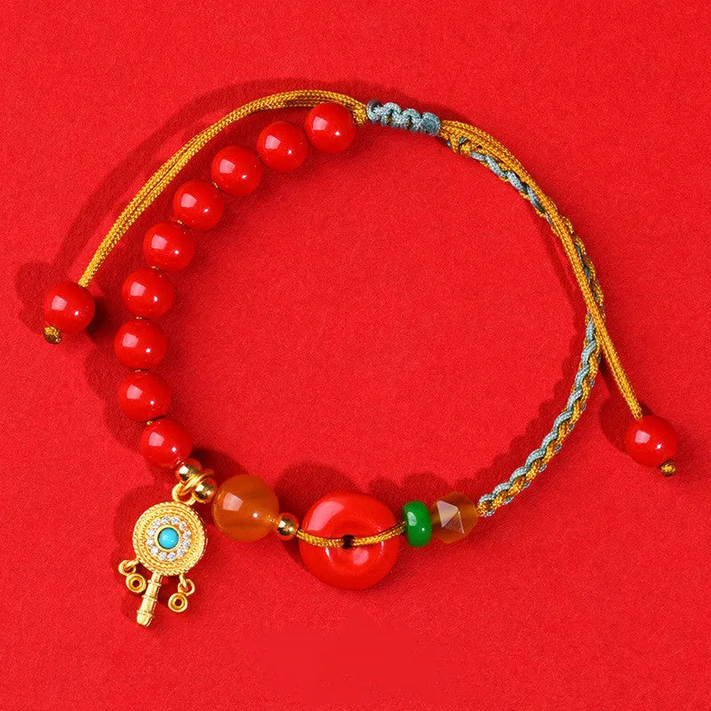 Cinnabar peace buckle woven bracelet in emperor red sand colour with hand-woven geometry design