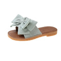 Women's slip-on cloth sandals with suede upper and decorative bow in beige colour