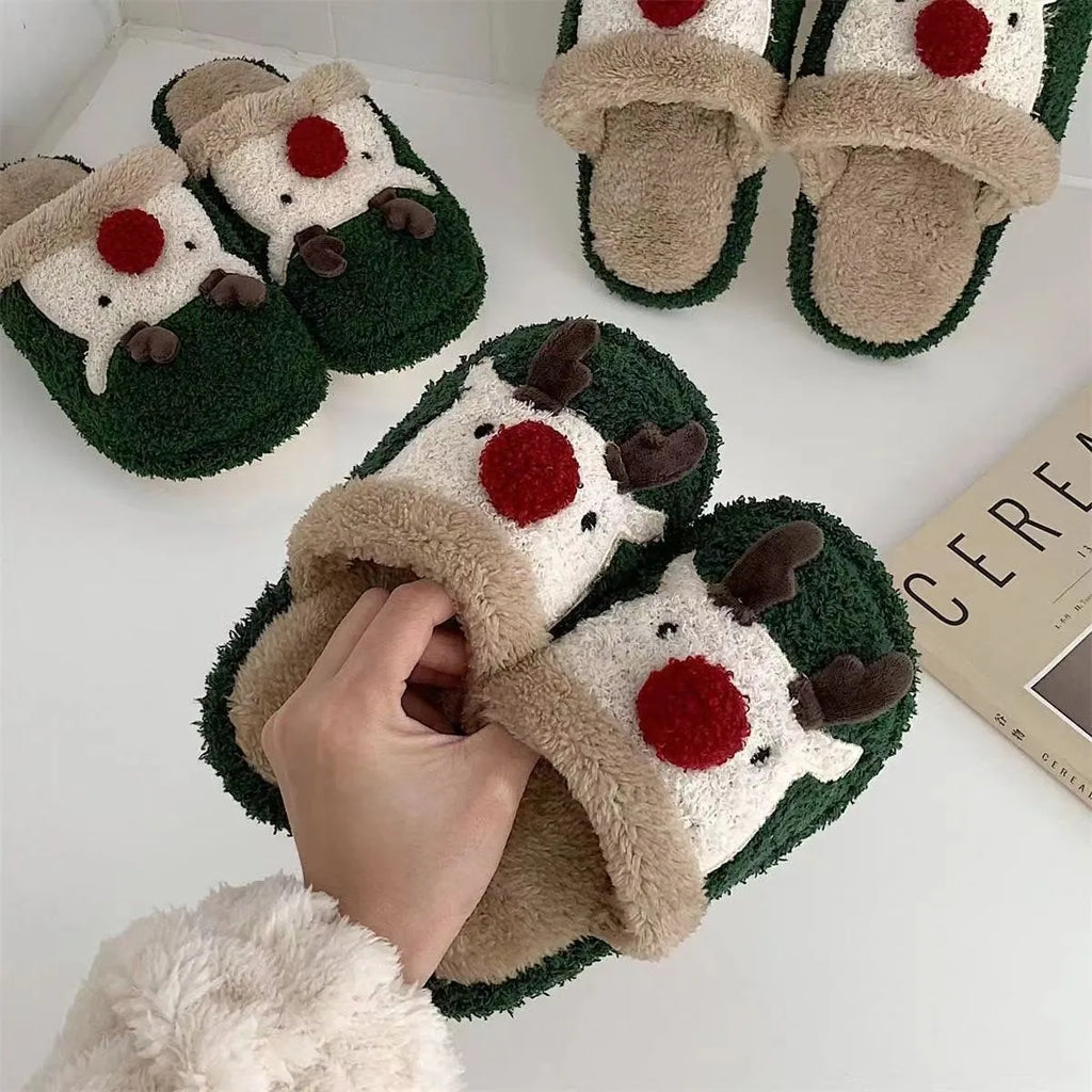 Women's Christmas deer design plush slippers with non-slip PVC soles in green, pink, and brown colours