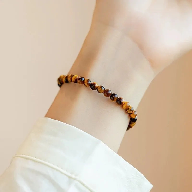 Tiger's Eye stone bracelet with geometric design in New Chinese style showing different bead sizes