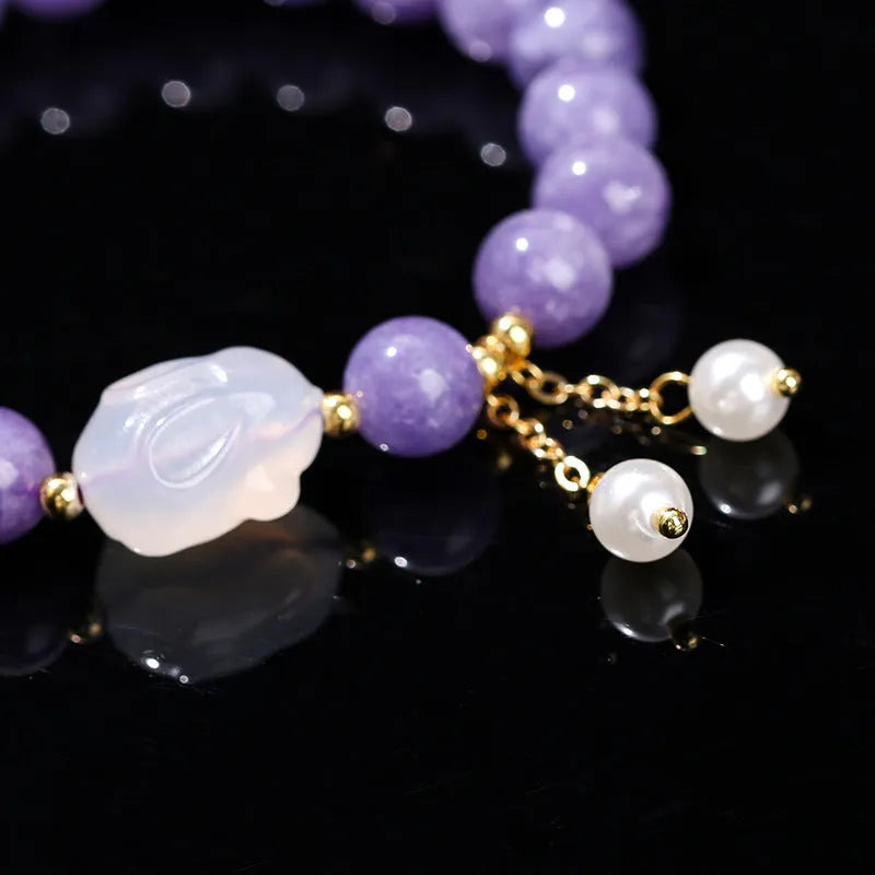 Purple aquamarine chalcedony bracelet with geometric beads and agate rabbit motif