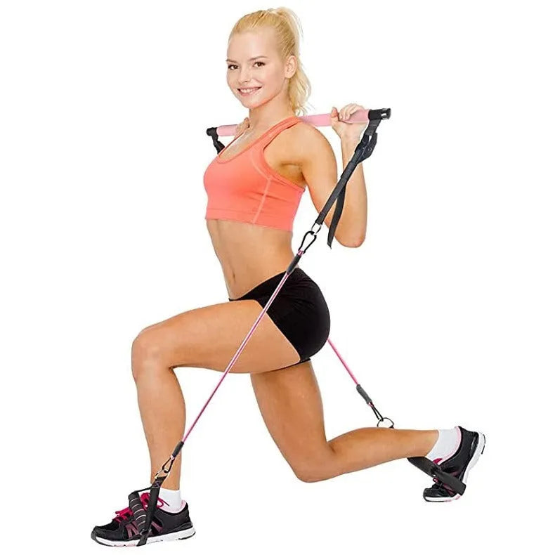 Set of 11 pink, purple, and black TPE fitness rope stretch sticks for resistance training.