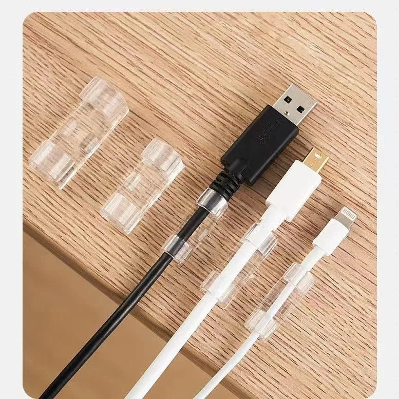 Transparent plastic self-adhesive cable clips for wire organisation in four sizes