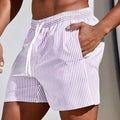 Men's loose mesh sports shorts in micro-elastic polyester for summer beach and football activities
