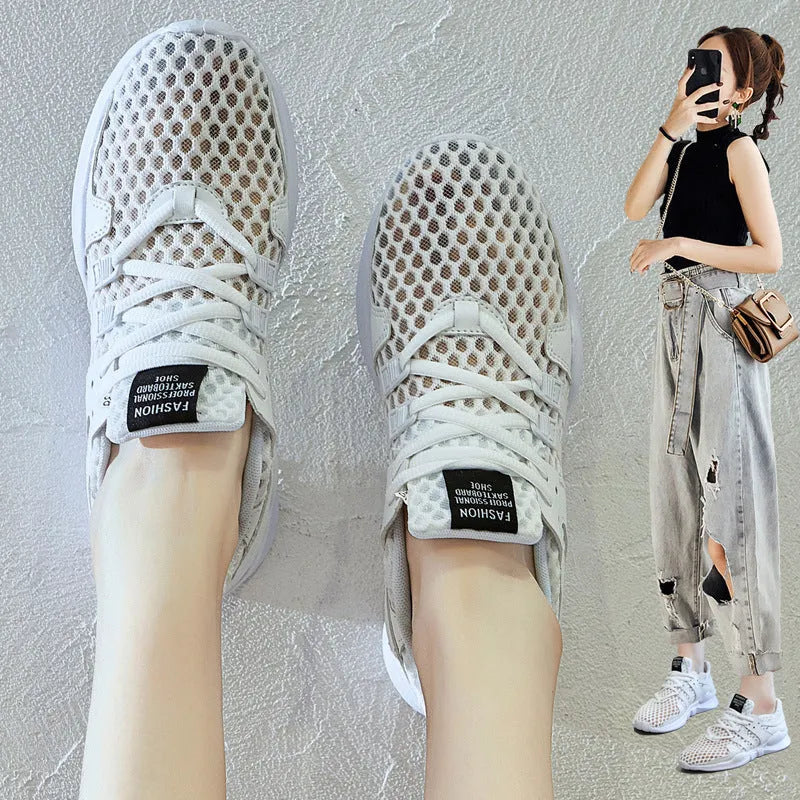Breathable mesh casual sneakers with hollow-out design and round toe in black and white colour options
