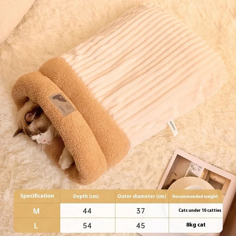 Brown semi-enclosed pet sleeping bag with plush lining on a wooden floor.