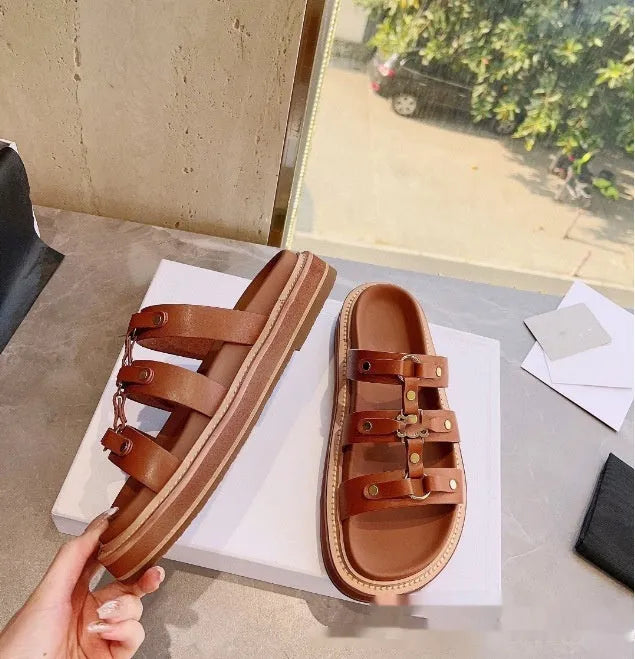 Women's retro Roman style sandal slippers in black with sheepskin upper and patent leather finish