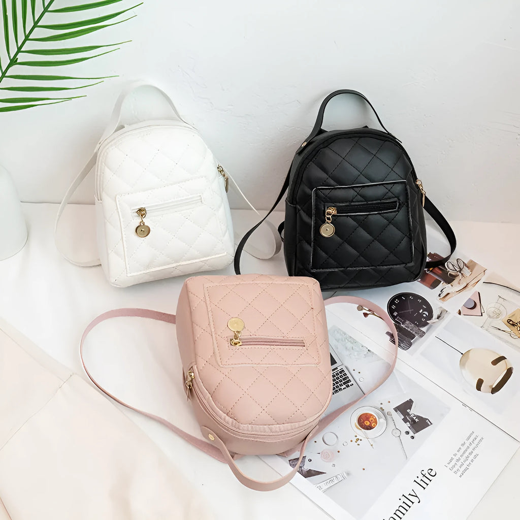 Girls' square hard PU backpack with embroidery, soft handle, in white, black, or pink.